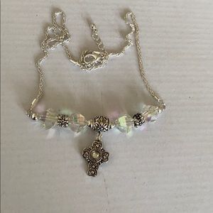 Silver cross with charm necklace